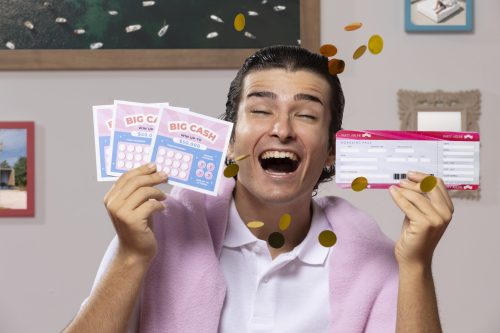 front-view-smiley-man-with-lottery-tickets